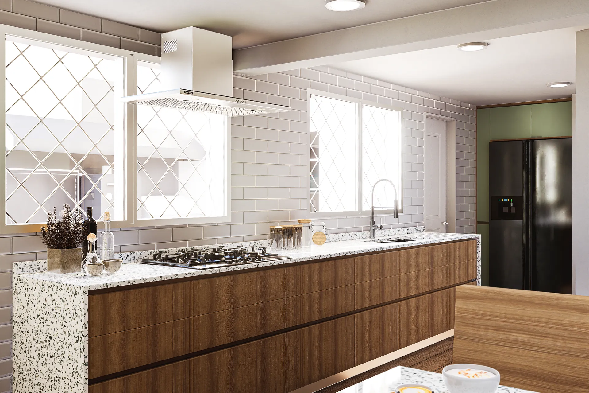 Cocina con isla de granito, campana blanca y ventana, Casa Monseñor Eyzaguirre