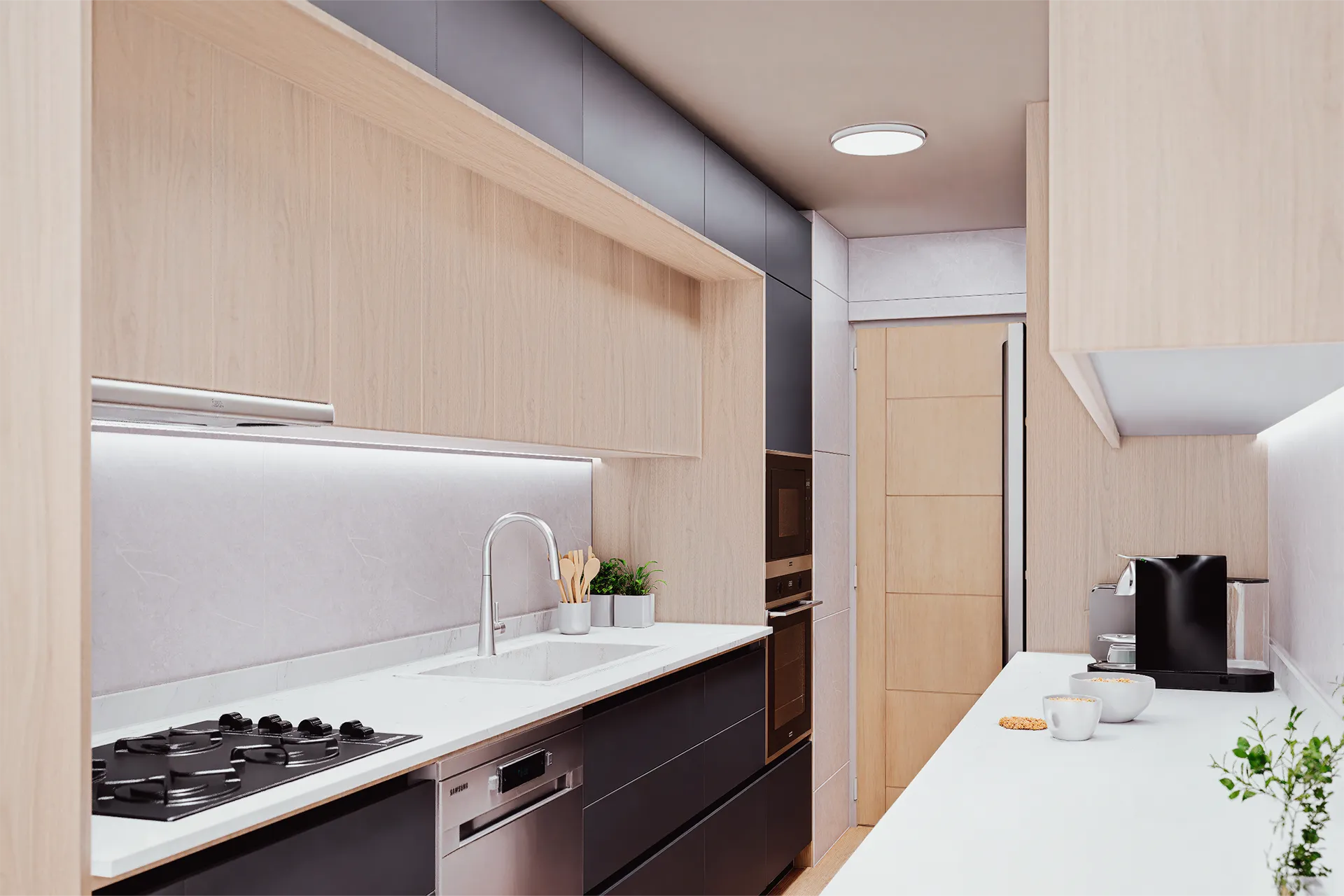 Cocina lineal con muebles de madera clara y encimera blanca, Cocina Del Mirador