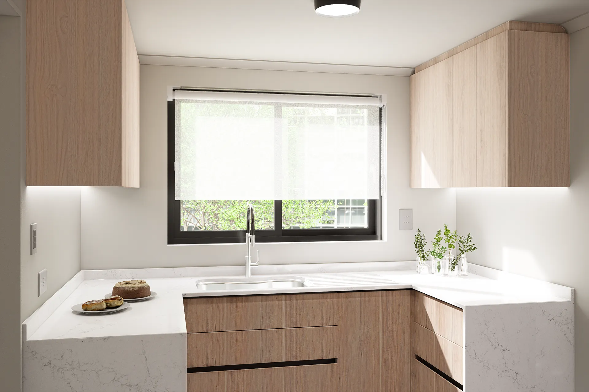 Lavaplatos bajo la ventana con encimera de cuarzo, Cocina Las Araucarias