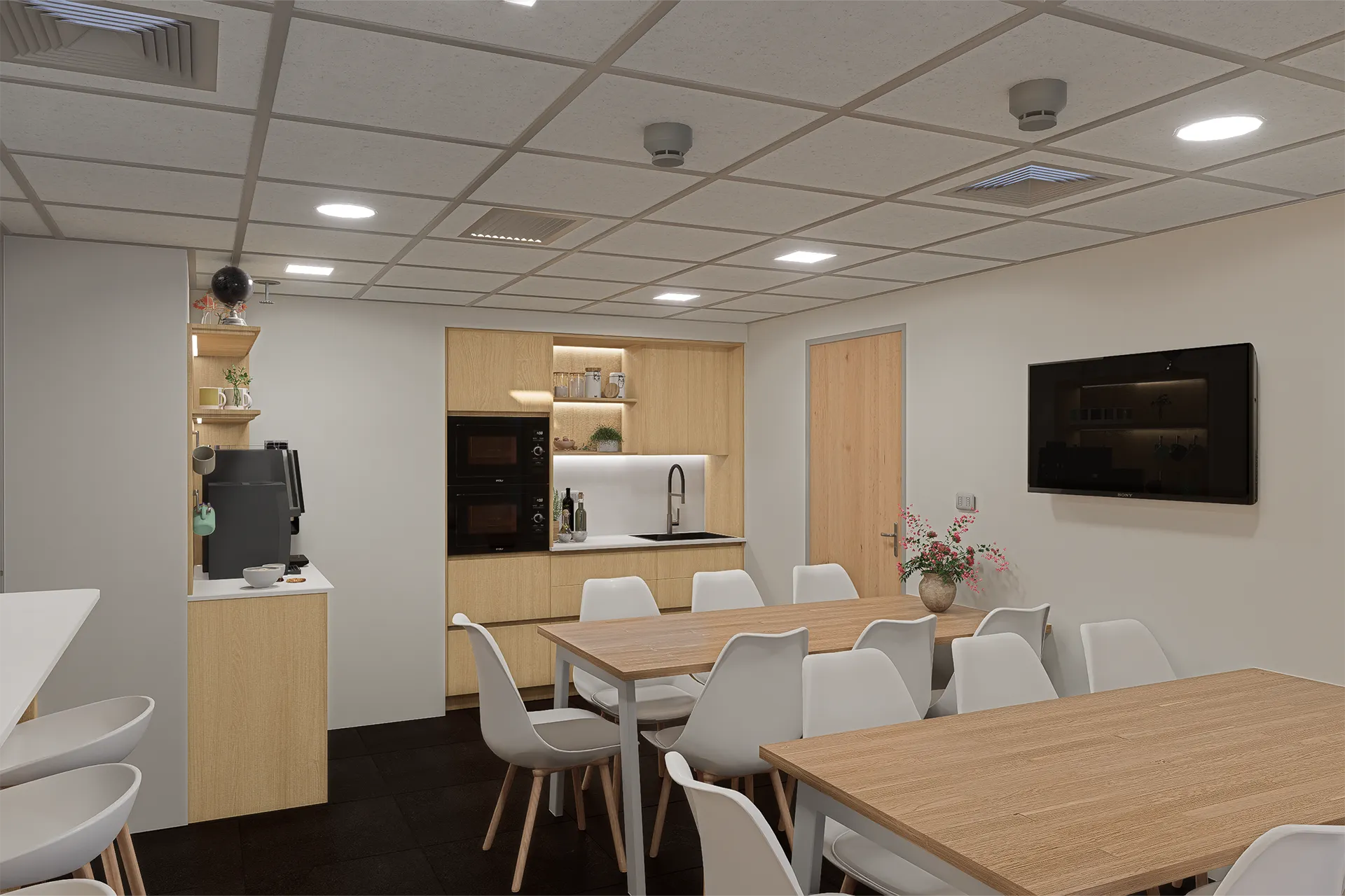 Mesa comunitaria con televisor y sillas blancas, Comedor Consorcio